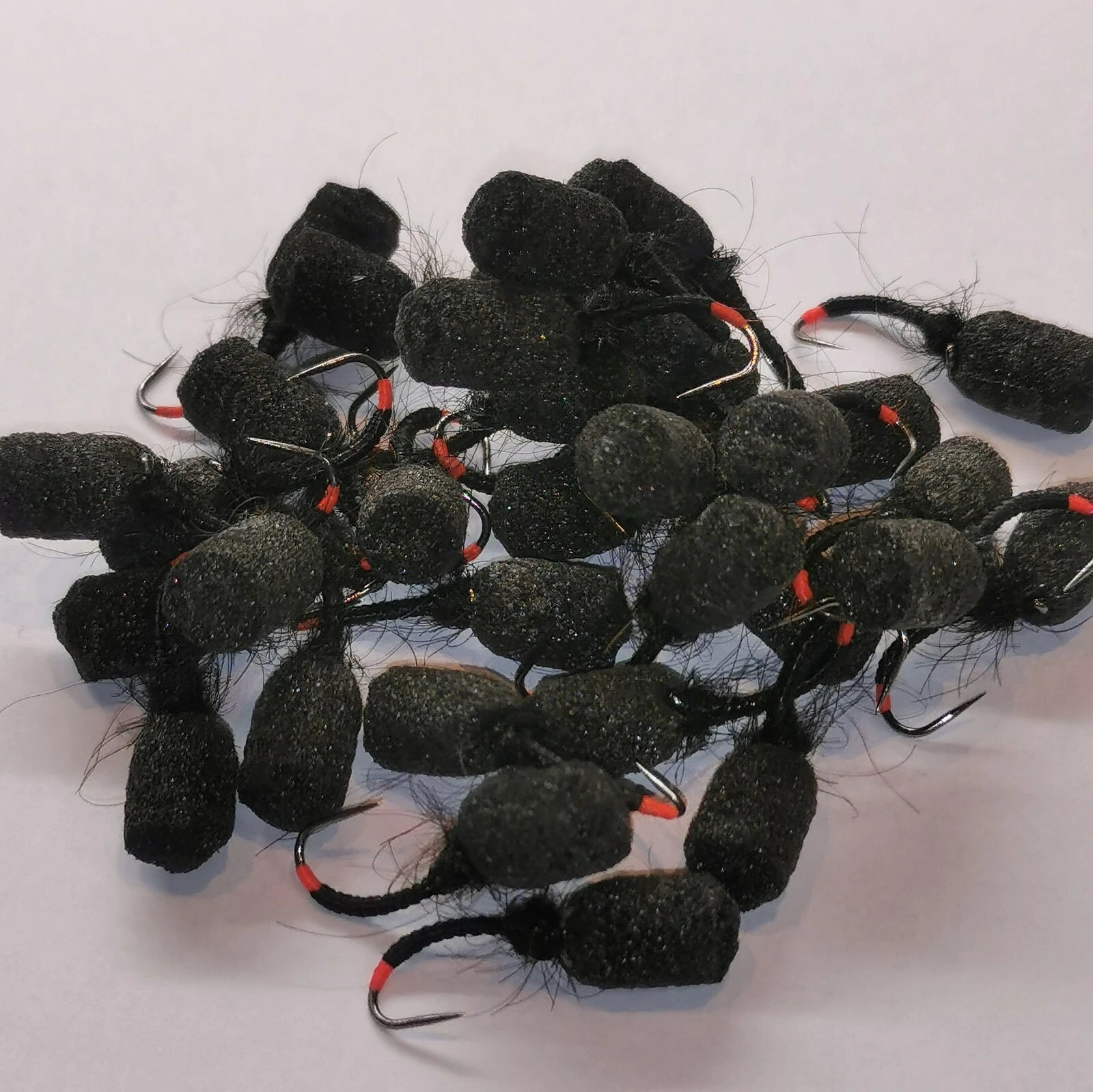6 Black suspender top hat emerger black foam Buzzer red tag. Trout Fly Fishing